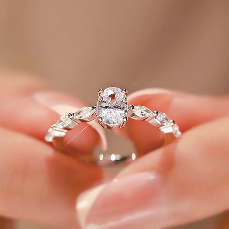Novo 925 cor prata oval anel feminino requintado moda metal incrustado aaa zircão pedras anel de casamento noivado jóias finas